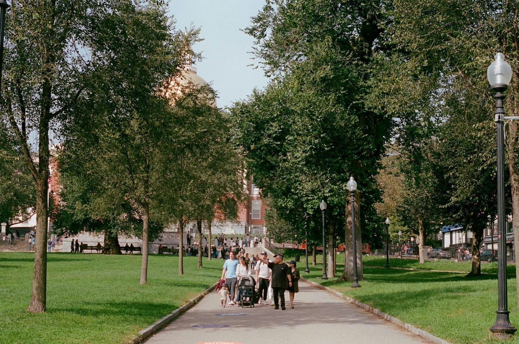 Image of parents and students touring a college campus